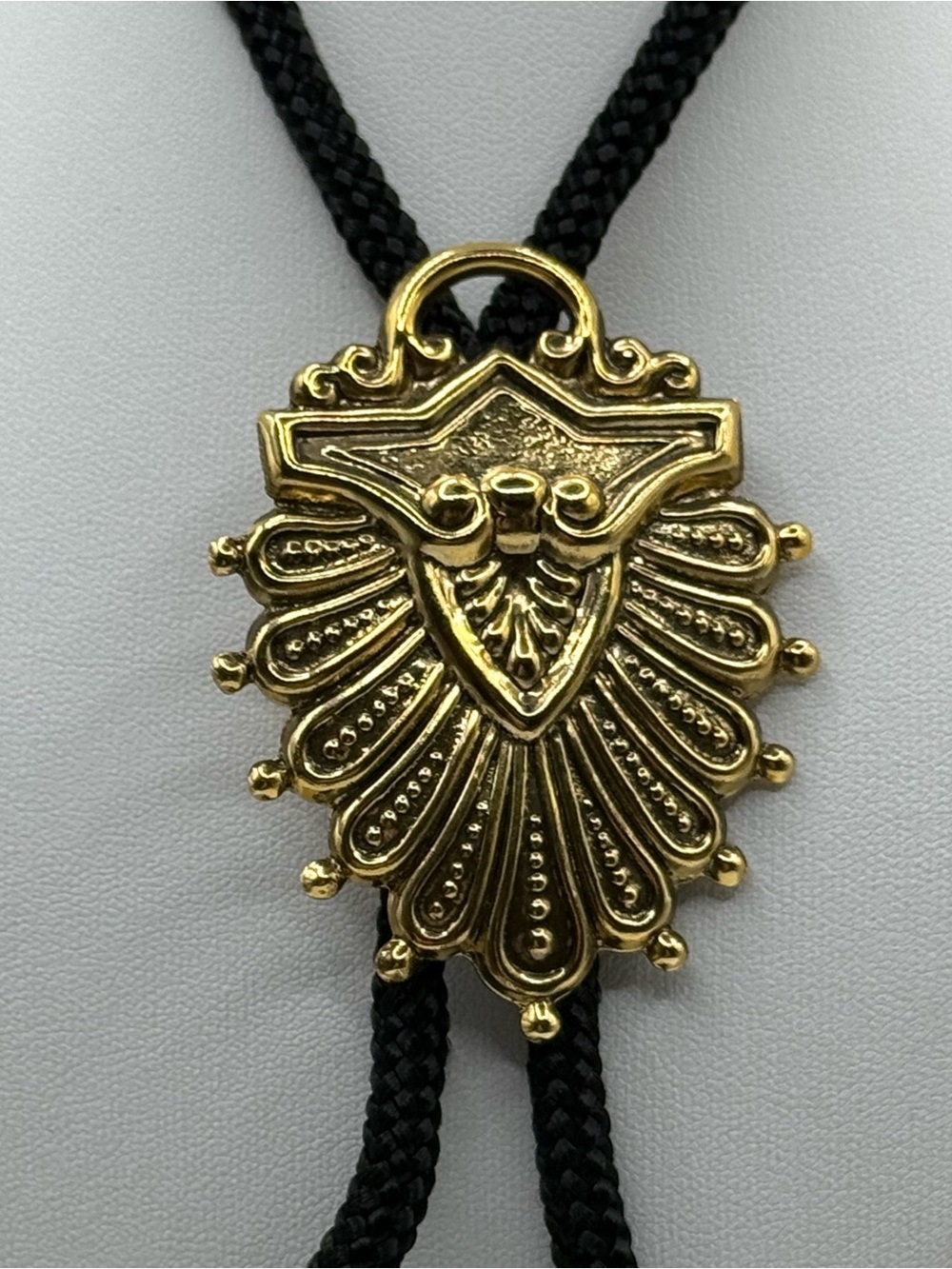 Gold Shield Pendant Bolo Tie Necklace - Black Cord - Picture 3 of 6